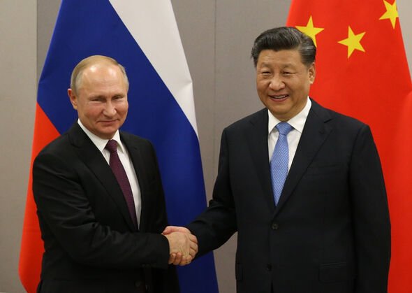 Le président russe Vladimir Poutine avec le dirigeant chinois Xi Jinping.